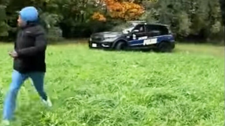 Police Officer Caught On Video Trying To Run Down A Man