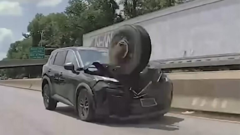 Runaway Tire Jumps Highway Median And Wrecks A Nissan SUV On Camera